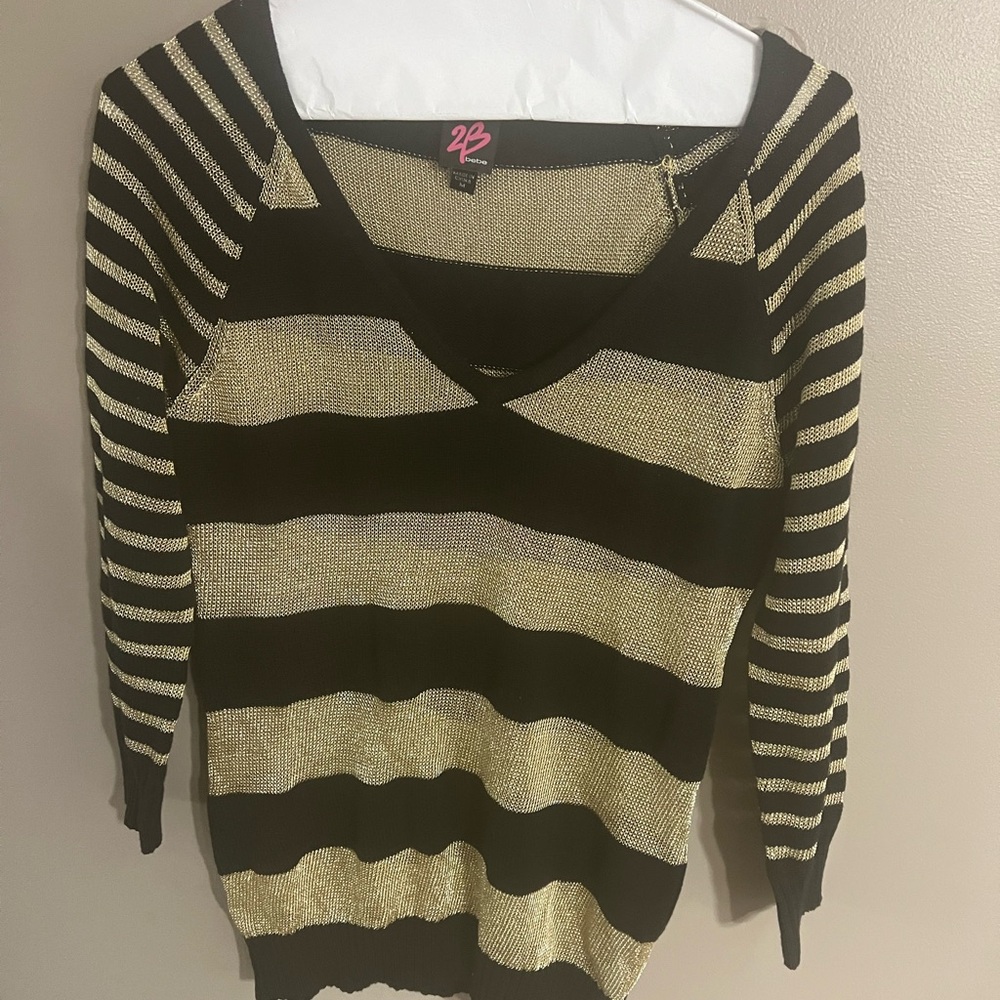 2B Bebe gold, and black sweater.